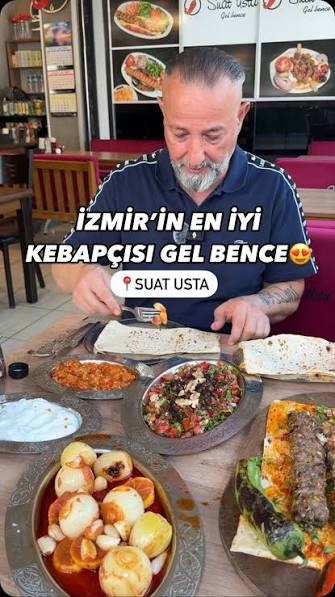 Suat Usta dükkanı önündeki tabela ve güncel fiyat listesi